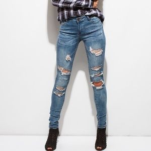 BLUE WASHED DENIM MID RISE DESTROYED RIPPED SKINNY